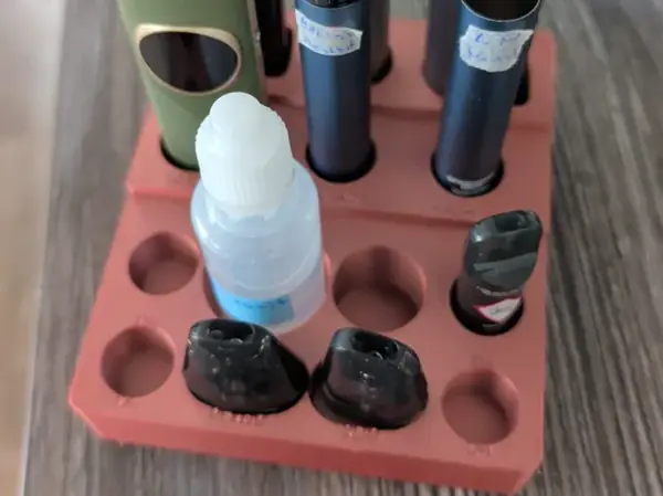 Vape Pod & Liquid Stand
